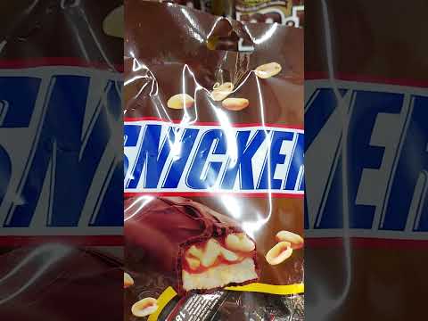 Satisfying sounds of SNICKERS #asmr #satisfying #shorts #viral #chocolate