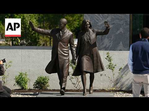 Obama museum opens in Chicago where visitors can sit behind Oval Office desk