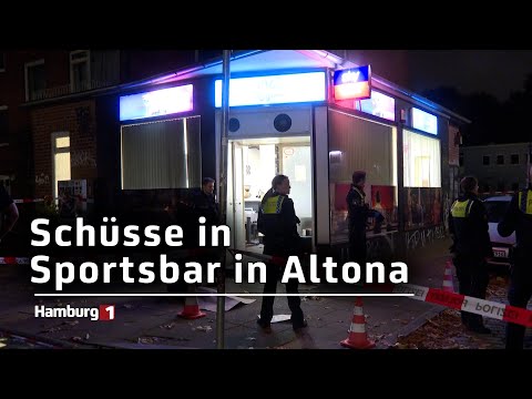 Vier bewaffnete Männer stürmen in Sportsbar - Eine Person erleidet Schussverletzung