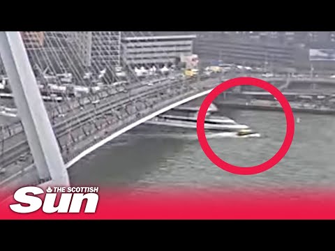 Shocking moment small water taxi collides with huge tour boat in Rotterdam with 6 people onboard