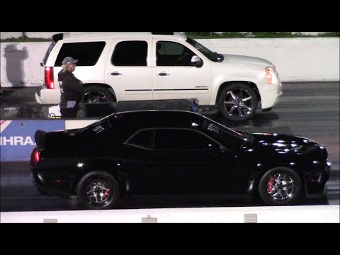 Thumbnail for TURBO Yukon Denali vs Mustang, Audi RS3, Hellcat Challenger and SRT10 Ram 1/4 Mile Drag Racing by Audi