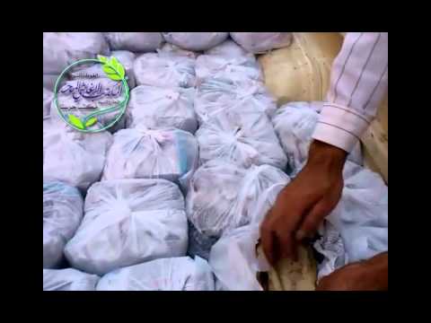 توزيع وجبات طعام في حرستا في ريف دمشق من قبل المكتب الإغاثي الموحد في الغوطة الشرقية