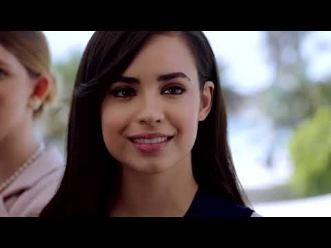 Trailer shot of stage lights and audience silhouettes, echoing the finale duet energy