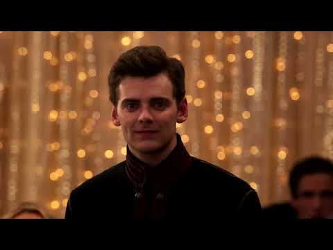 Trailer frame of stage choreography, tying to the album’s dance-pop cues