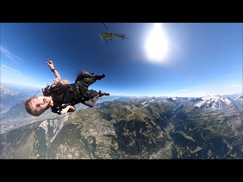 Skydiving out of a helicopter at 4000m over Verbier