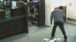 Bank robbery fail: Suspect drops thousands of dollars in bank and gets caught