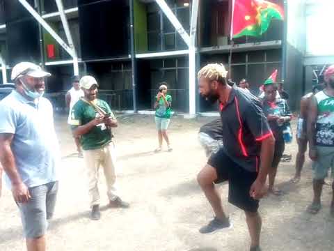Justin olam doing war cry after win of local club in PNG
