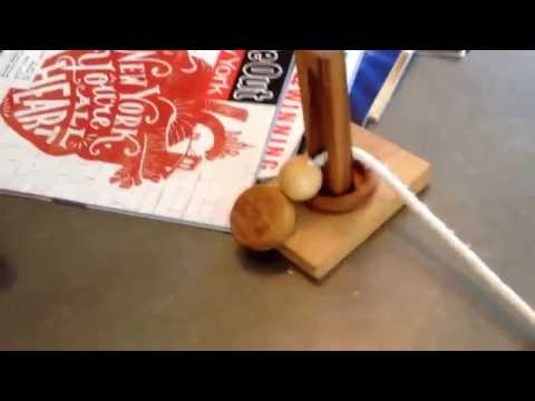 Solving Wooden Oliver / Eureka Puzzle - Ring, String, Post