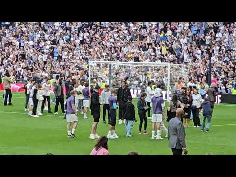 LAP OF APPRECIATION: The Tottenham Players After the Game: Spurs Staff With Their Friends and Family