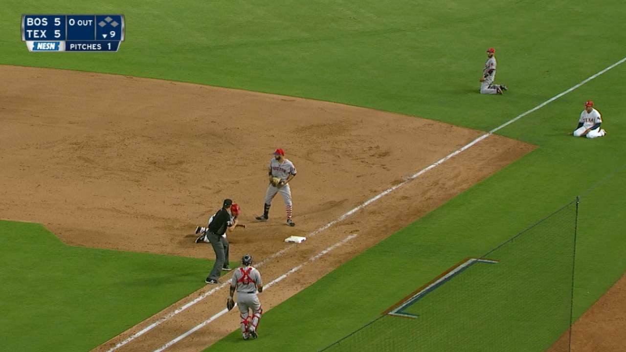 Pedroia makes barehanded stop, falling throw