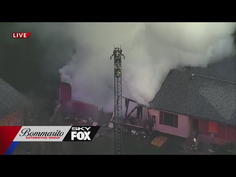 Firefighters battle heavy smoke at apartment fire in Ferguson
