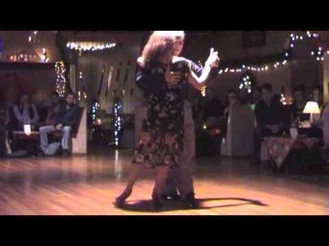  Claudia Jakobsen  and  Jorge Fatauros  are  dancing  to  the  milonga  "  Ella Es Asi  "  by  Edgardo Donato  in  2013
