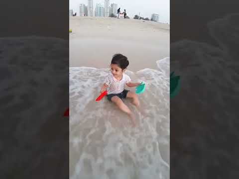 cute baby..enjoy@ beach