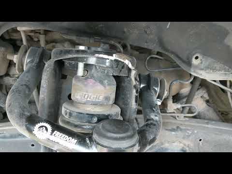 Freedom Off Road UCA's first gen Tundra. hits the top of the shock tower