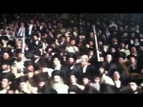 Toldos Avrom Yitzchok rebbe lighting the fire on lag b'omer