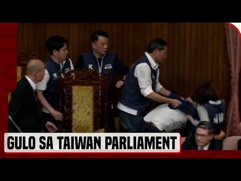 Taiwan lawmakers exchange blows in bitter dispute over parliament reforms