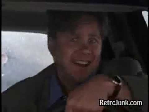 Nothing to Lose (1997) trailer still — Robbins and Lawrence in a getaway moment, with soundtrack energy rising