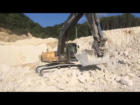 Оренда послуги гусеничного екскаватора з грейферним ковшем. Розліснення полів