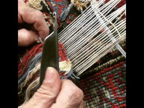reweaving corner of Heriz Rug