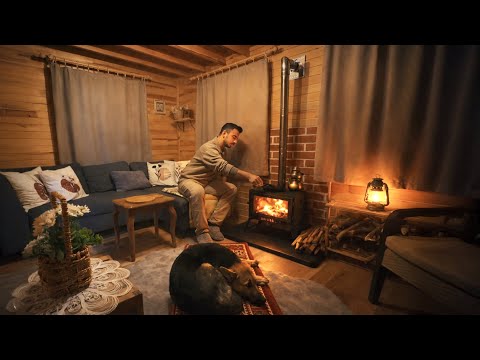A Snowy Winter Day in a Wooden Cabin with My Dog