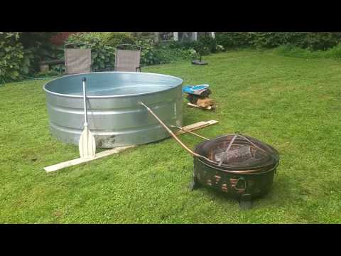 Off-grid DIY wood-fired stock tank hot tub