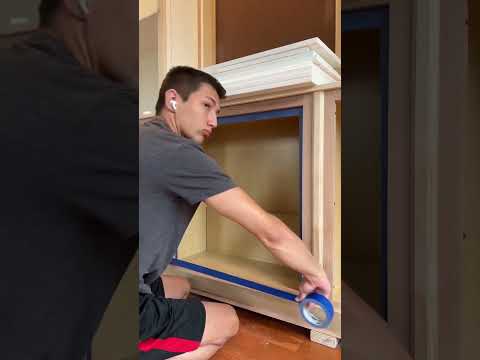 The easiest way to prep cabinet boxes for paint! #spraypaint #paintsprayer #painting