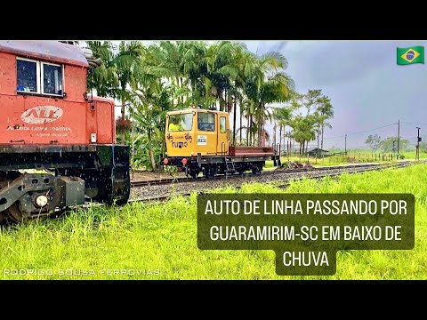Auto de linha Rumo passando por Guaramirim-Santa Catarina de baixo de chuva