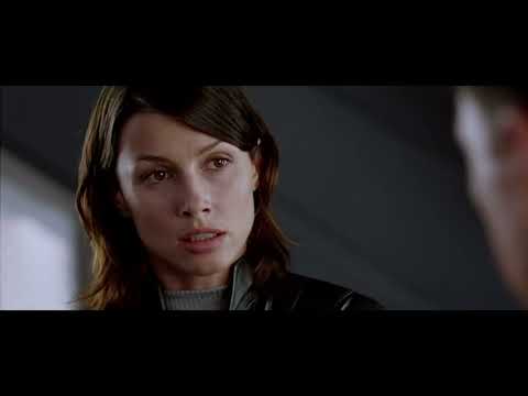 I, Robot 2004 trailer frame: Will Smith on a chrome bike racing through a tunnel as robots swarm