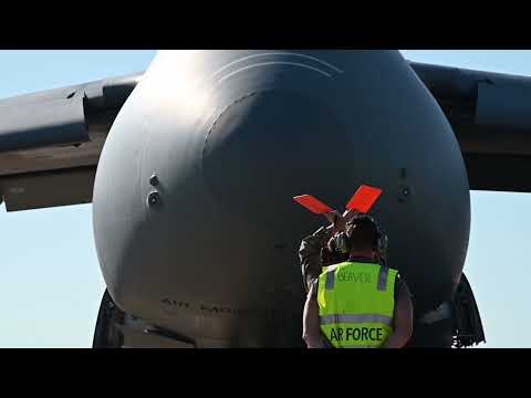 USAF Dover C5 Galaxy transport Marines AH-1Z Viper during MG23