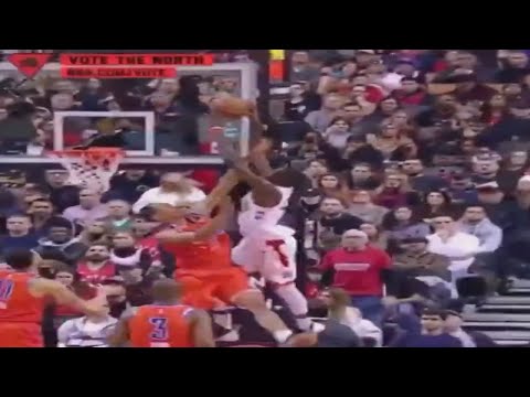 Toronto Raptors forward Chris Boucher catches the alley-oop and posters Darius Bazley!