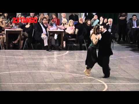  Vilma Fabiana Vega  and  Fernando Galera  are  dancing  to  the  tango  "  Corazon  "