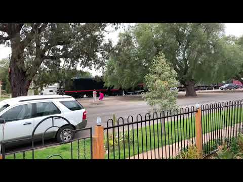 Very Steam engine train pushing an other engine