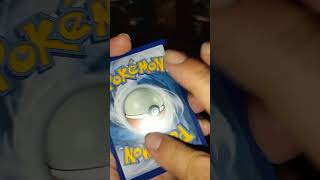 Pokemon opening a Darkrai whammy tin