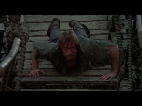 Missing In Action II-The Beginning - Chuck Norris Crossing A Bridge Very Carefully