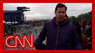 Water cannons aimed at migrants in tense border standoff video