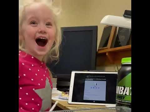 Little Girl talking to Siri