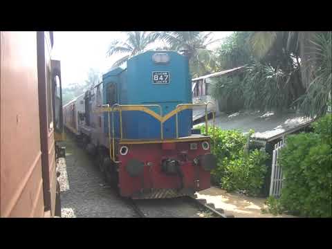 Sri Lanka Railways Brush EMD M7 811 and DLW WDM2 M8 847 "race" at Deliwala 23rd January 2023