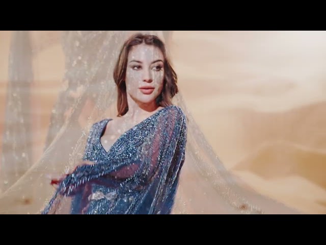 فستان سهره تول بقصه صدر v  شك كامل بالكريستال بأكمام طويله منسدله وحزا