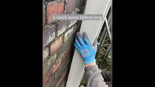 How to fix fencing post to brick wall