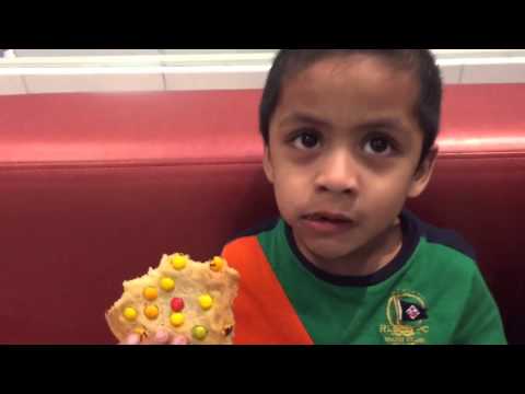 Guhan Ram and Gautham eating strawberry chocolate