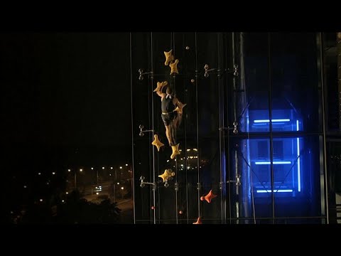Polish Speed climber beats lift in neon night race