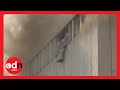 GRAPHIC CONTENT WARNING People Jump From 20 Storey Building In Pakistan To Escape Fire