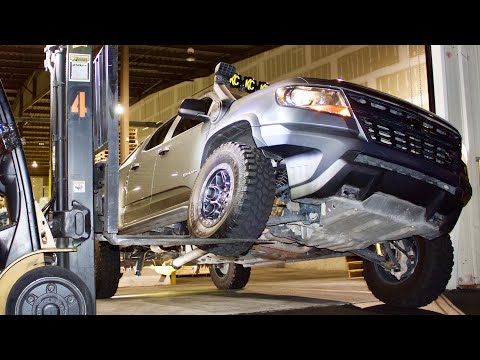 zr2 shock warranty and skid plate install.