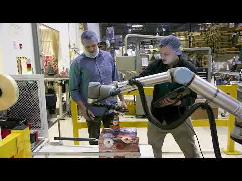 AS40 Conveyor in Robotic Palletizing Application - QC Conveyors