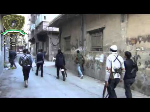 نتشار مقاتلي كتيبة السيف الدمشقي في حي التضامن في مدينة دمشق