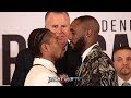 YORDENIS UGAS LOOKS DOWN ON SMALLER SHAWN PORTER DURING FACE OFF AT FINAL PRESS CONFERENCE