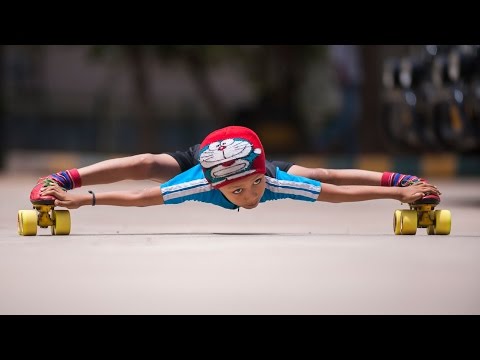 Watch A 6-Year-Old Roller Skate Underneath 39 Cars