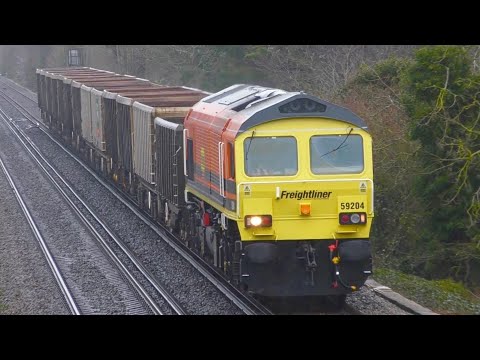 Freightliner 59204 In Orange Livery Passes Portchester For Merehead Quarry