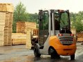 STILL forklift truck RX 70 - wood and rain 