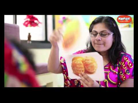 Mother showing Krazy flash cards to her child at age 11 months